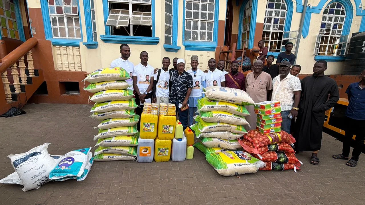 Alhaji Abu Sesay leading a community giving initiative