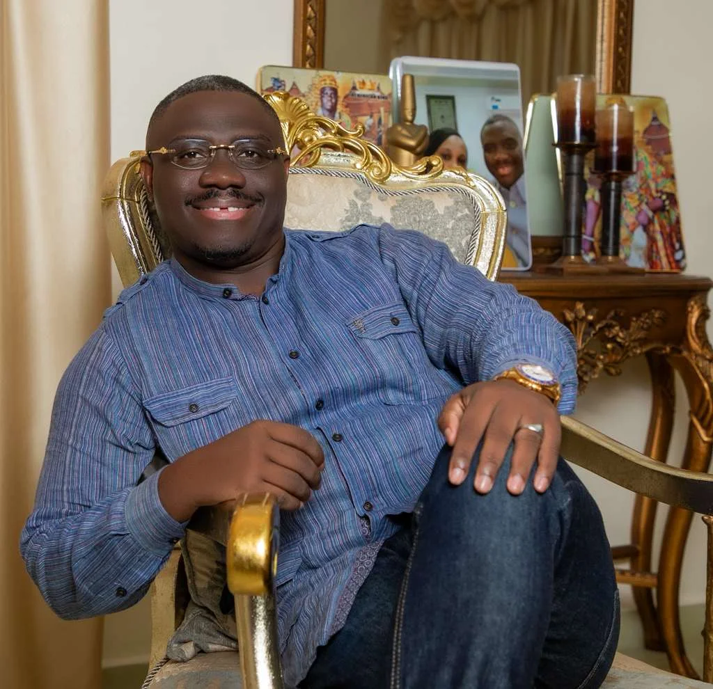 Alhaji Abu Sesay seated in his private library